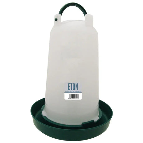 White translucent plastic poultry drinker with dark green base and handle branded eton livestock appliances eton ts poultry drinker green