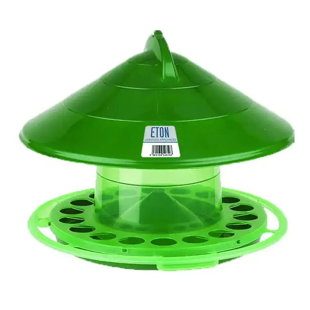 Green plastic eton tsa wild bird feeder with conical roof and circular base featuring multiple feeding holes