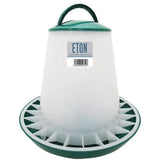Eton tsf poultry feeder green is a white and green robust plastic feeder with a twist lock base and handle on top