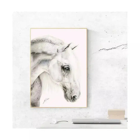 A delicate graphite sketch print flea bitten grey of a white horse head framed in a slender light wood backing board