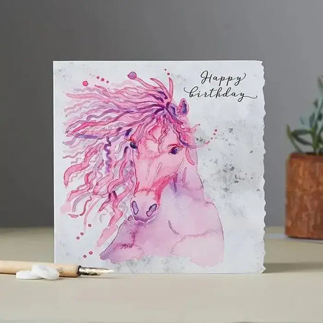 A fanciful dolomite card happy birthday featuring a pink horse with flowing mane on a textured white background 150x150mm