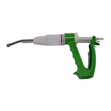 Green plastic veterinary syringe with clear barrel and metal needle for equestrian use farmaco dial-o-doser horses