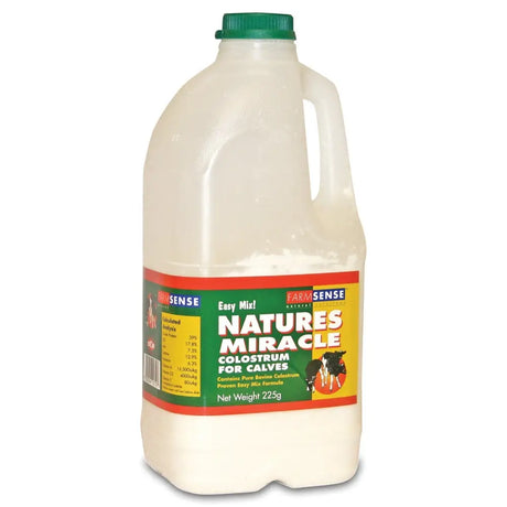 A white plastic jug with green cap labeled farmsense nature’s miracle pure bovine colostrum for newborn calf deprived care