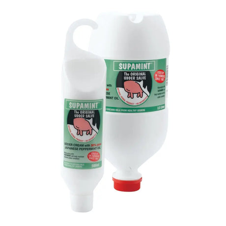 White plastic farmsense supamint udder cream bottles with green labels pink pig and red caps to improve udder condition