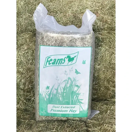 A bag of fearns farm premium hay with green and white label featuring horse logo and timothy rye grass mix