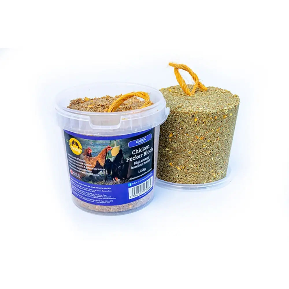 A clear container with feldy chicken pecker block and a greenish chicken pecker block with a convenient hanging rope
