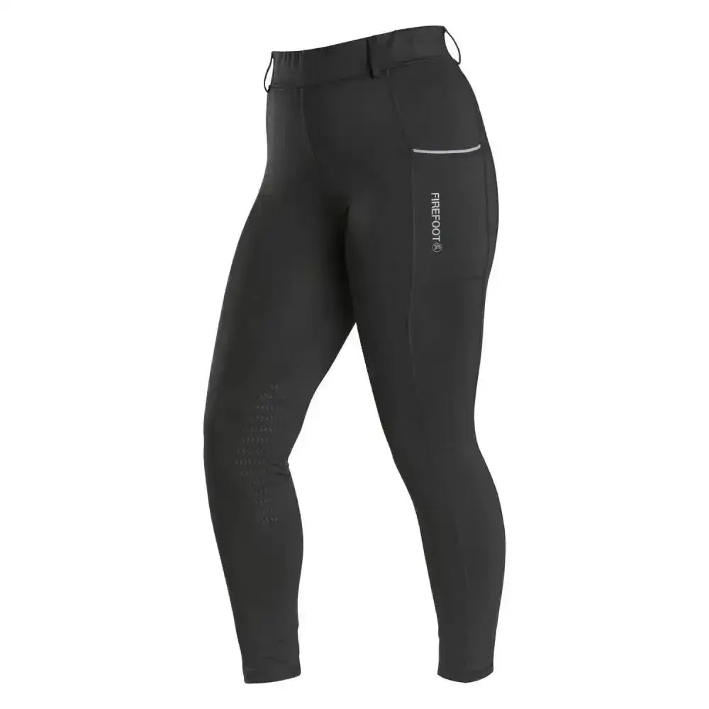 Black firefoot howden riding tights kids with sleek fit and subtle reflective side pocket detailing