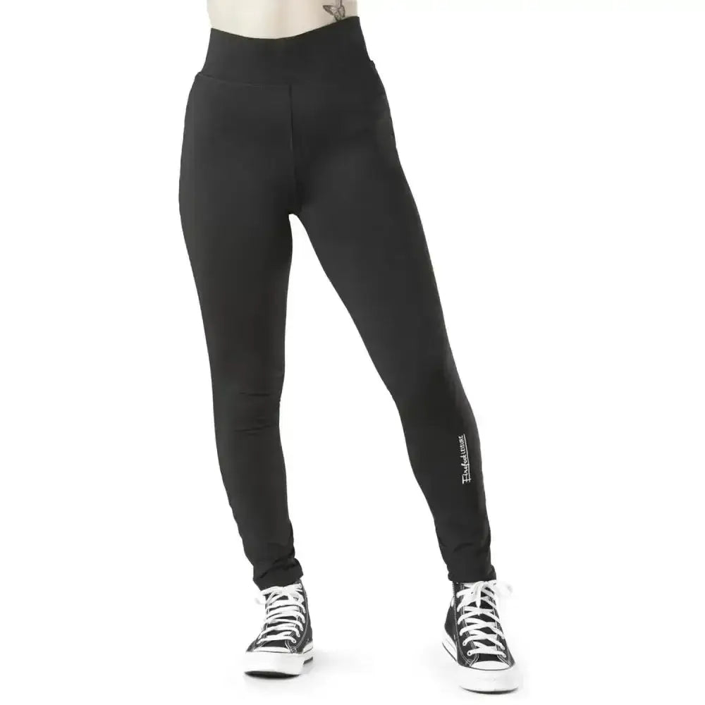 Black high-waisted firefoot richmond plain stretchy leggings with subtle white logo on the lower leg