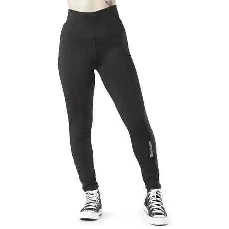 Black firefoot richmond plain high waisted leggings with subtle white logo on lower leg in stretchy material
