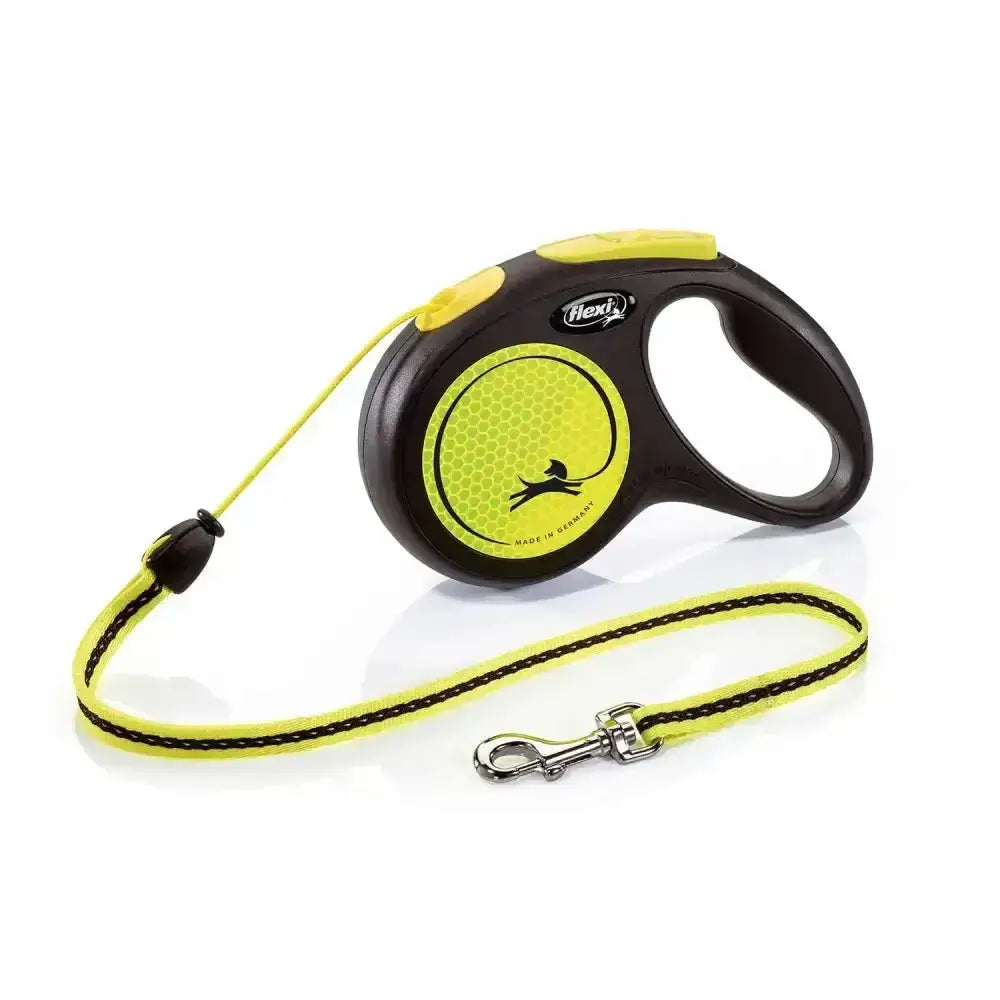 Flexi new neon cord yellow retractable dog leash with bright yellow woven strap and ergonomic handle for enhanced visibility