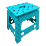 Mint green foldable step stool made of lightweight plastic with hexagonal cutouts and a central handle for easy carrying