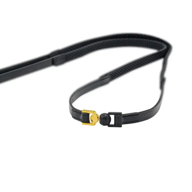 Black camera strap with yellow metal attachment, featuring Vincitore Original Reins and quick-release connector