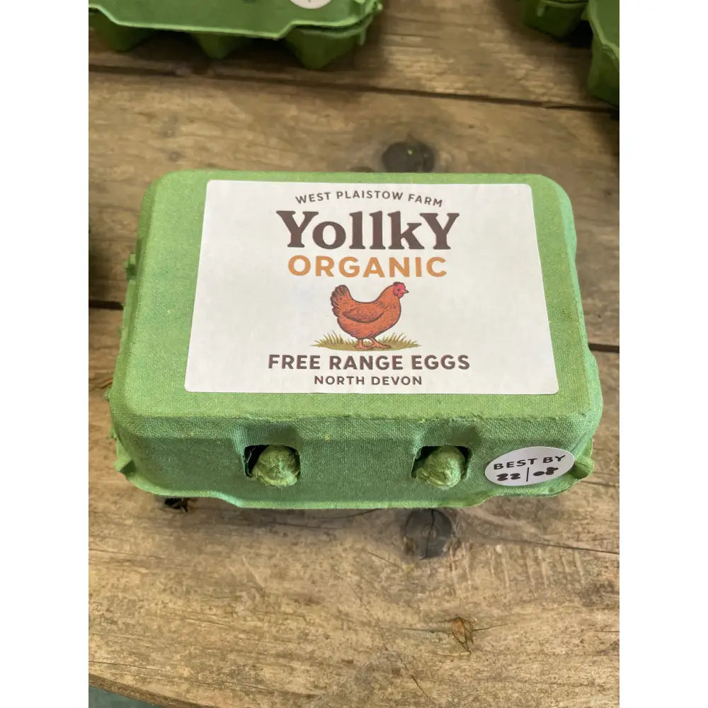 Green cardboard egg carton of yolky organic free range eggs from west plaistow farm north devon range eggs organically