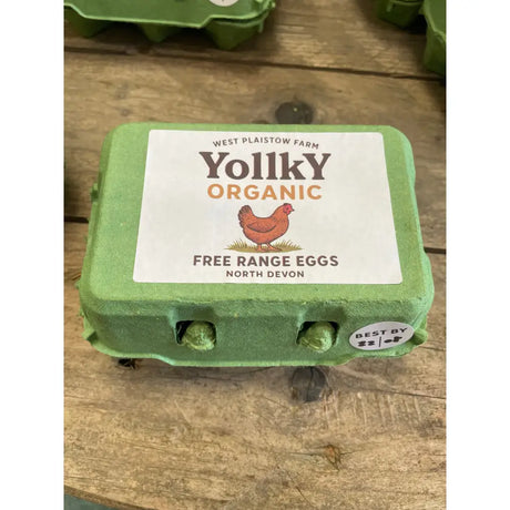 Green cardboard egg carton of yolky organic free range eggs from west plaistow farm north devon range eggs organically