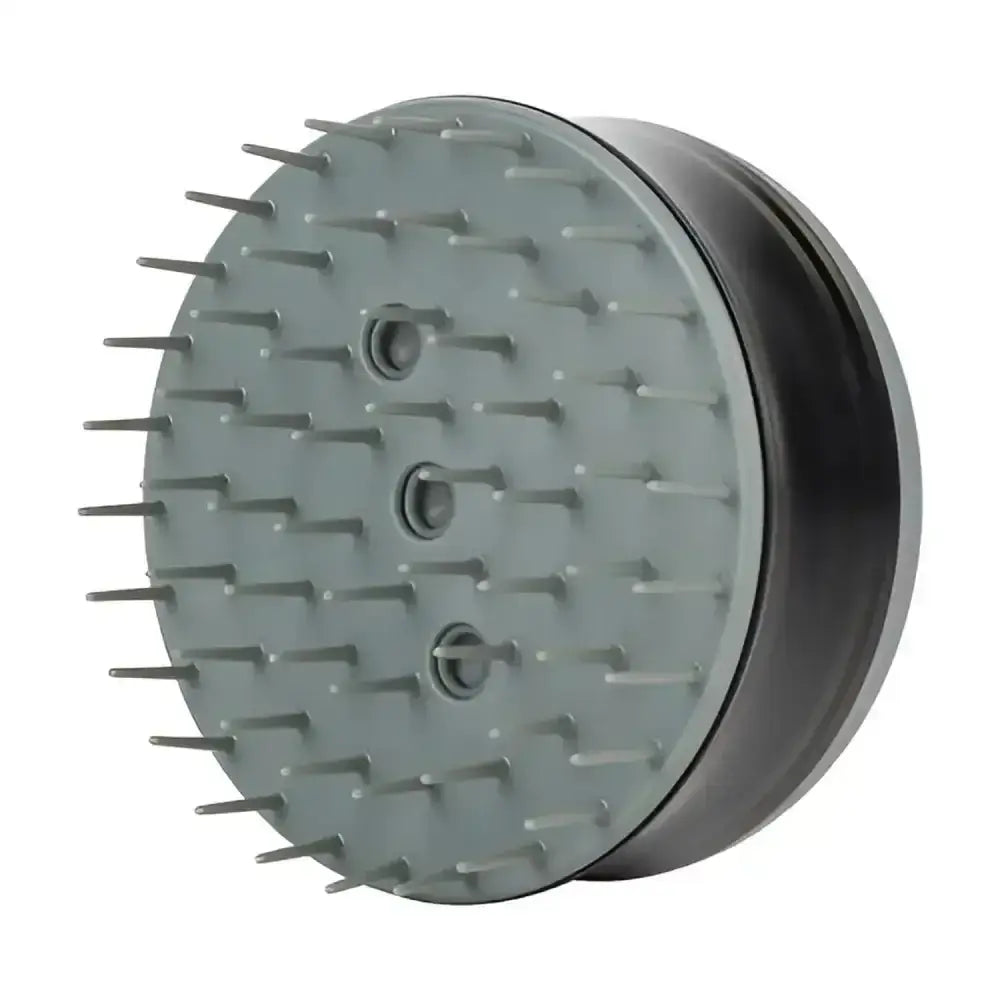 Gray plastic furminator bathing brush with short bristles and three circular openings to loosen pet hair and promote shiny coats