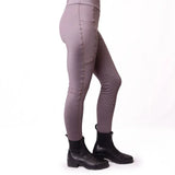 A pair of taupe silicone knee riding tights with a subtle sheen and perforated knee panels for kids by gallop