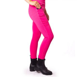 Bright pink gallop children’s silicone knee riding tights with sleek form-fitting design and subtle side seam detailing