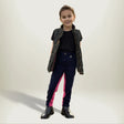 Young child in Gallop Children’s Two Tone Jodhpurs showcasing eye-catching contrast