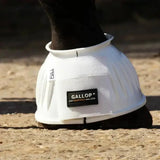 White gallop double taped pvc ribbed over reach boot with black branding label and full hoof coverage