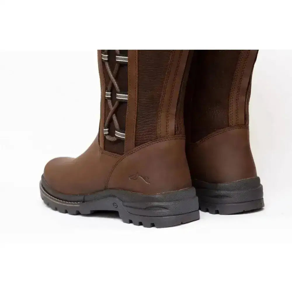 Brown leather gallop gateley country boot with dark gray rubber soles and white laces for outdoor use