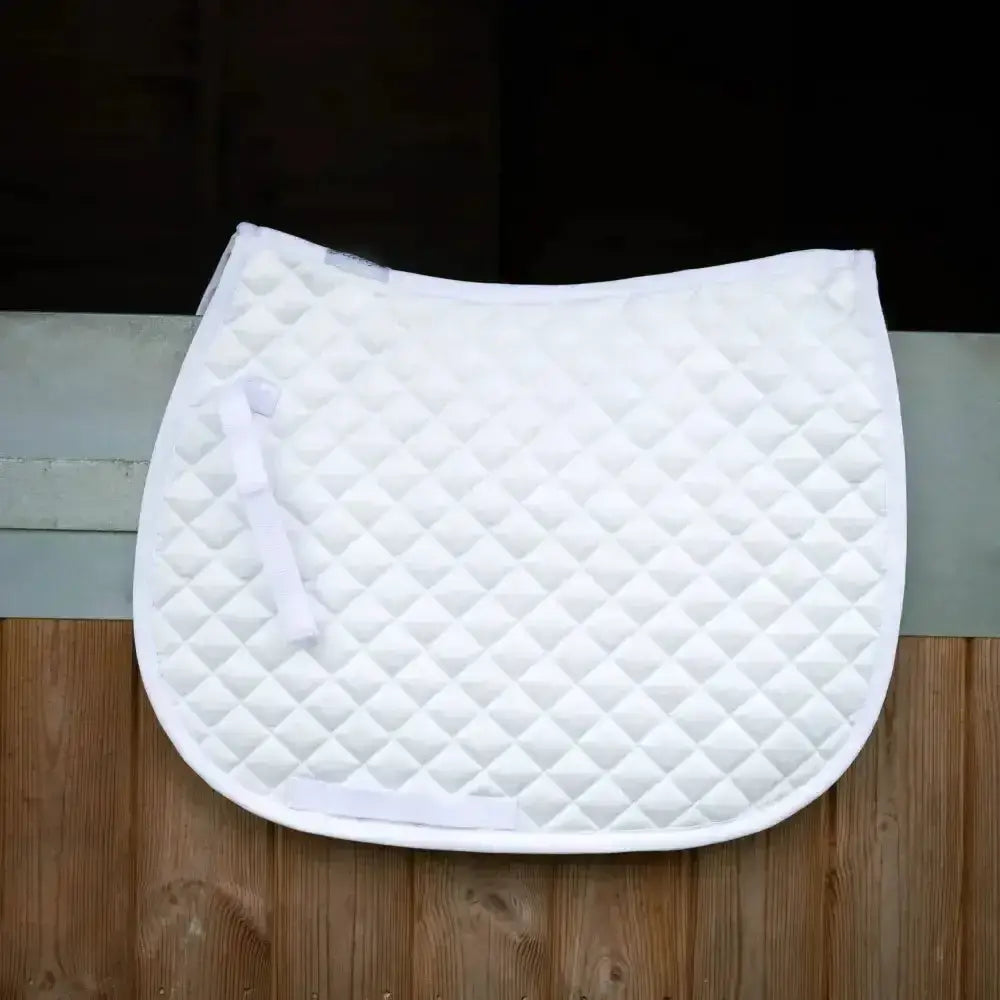 White quilted saddle pad with diamond stitching and soft padding from the gallop high density quilted saddle line