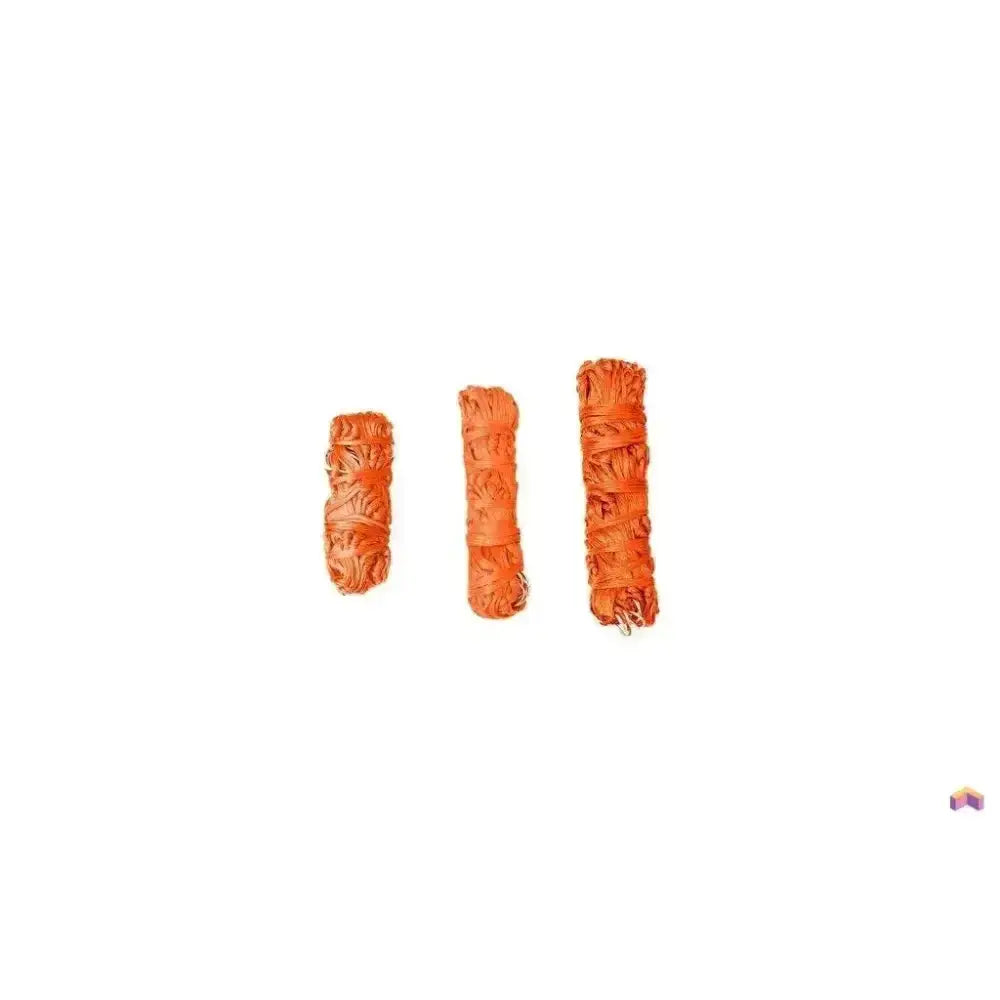Three orange sage bundles with length tie string shown alongside the gallop large haynet for secure feed use