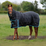 Dark navy gallop maverick 300g quilted stable rug with light blue trim and troian branding for heavyweight use