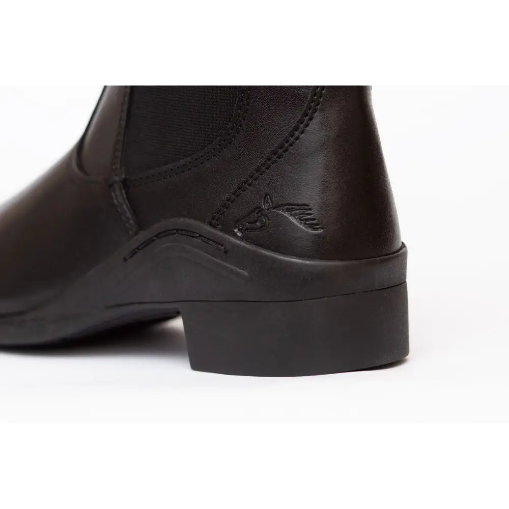 Dark leather ankle boot with low heel and elastic side panel for elegance leather paddock