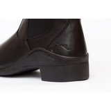 Dark leather ankle boot with low heel and elastic side panel for elegance leather paddock