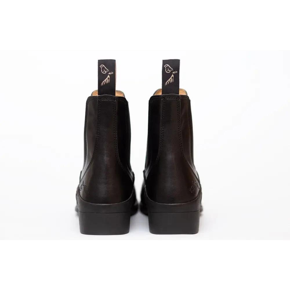 Black leather Chelsea boots with elastic side panels, perfect for children’s elegance leather paddock