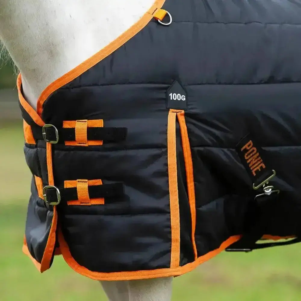 Black and orange quilted gallop ponie 100g stable rug with soft breathable lining and ponie branding