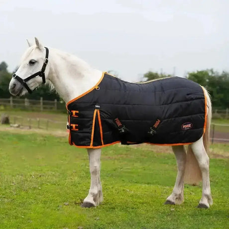 Black quilted gallop ponie 100g stable rug with orange trim, adjustable straps, and soft breathable lining