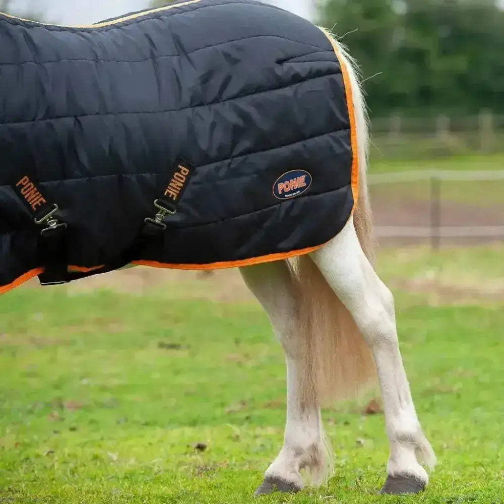 Black quilted gallop ponie 100g stable rug with orange trim and soft breathable lining for horses