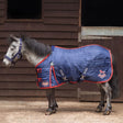 Blue quilted gallop ponie 200g stable rug with red trim and ponie 200g stable branding in navy color