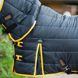 Dark blue quilted gallop ponie 200g medium weight combo stable rug with yellow trim and black buckles