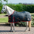 Dark blue quilted gallop ponie 200g stable rug medium weight with red trim black buckles and furse logo