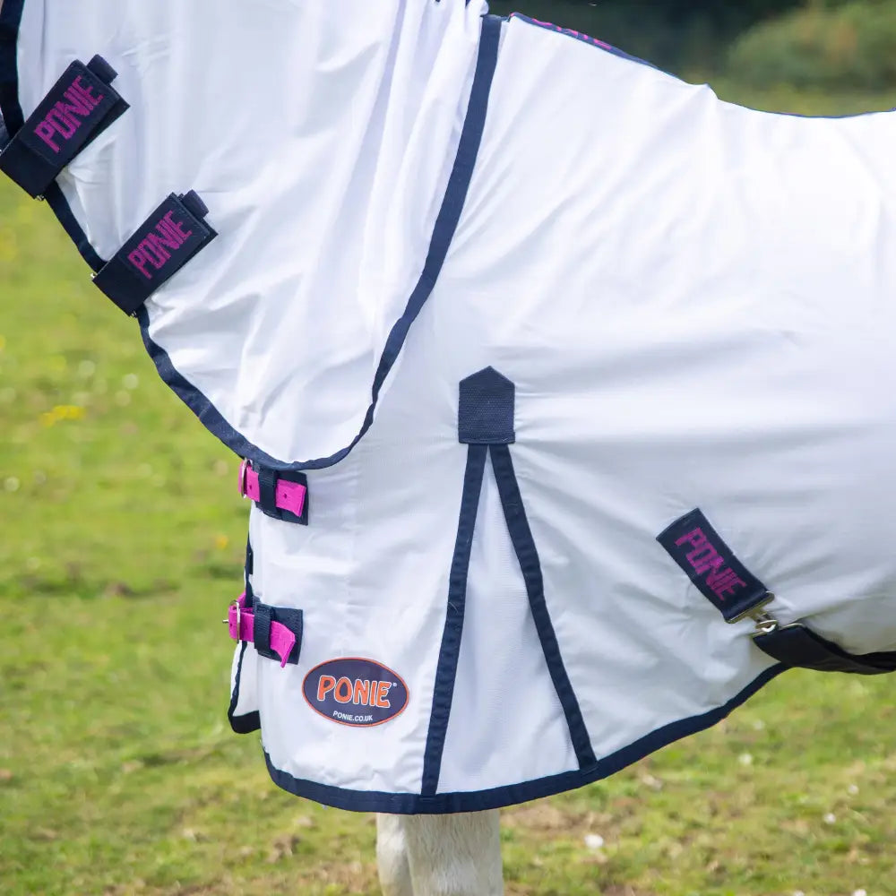 White ponie combo fly rug with navy blue trim and pink buckles from the gallop ponie essential line