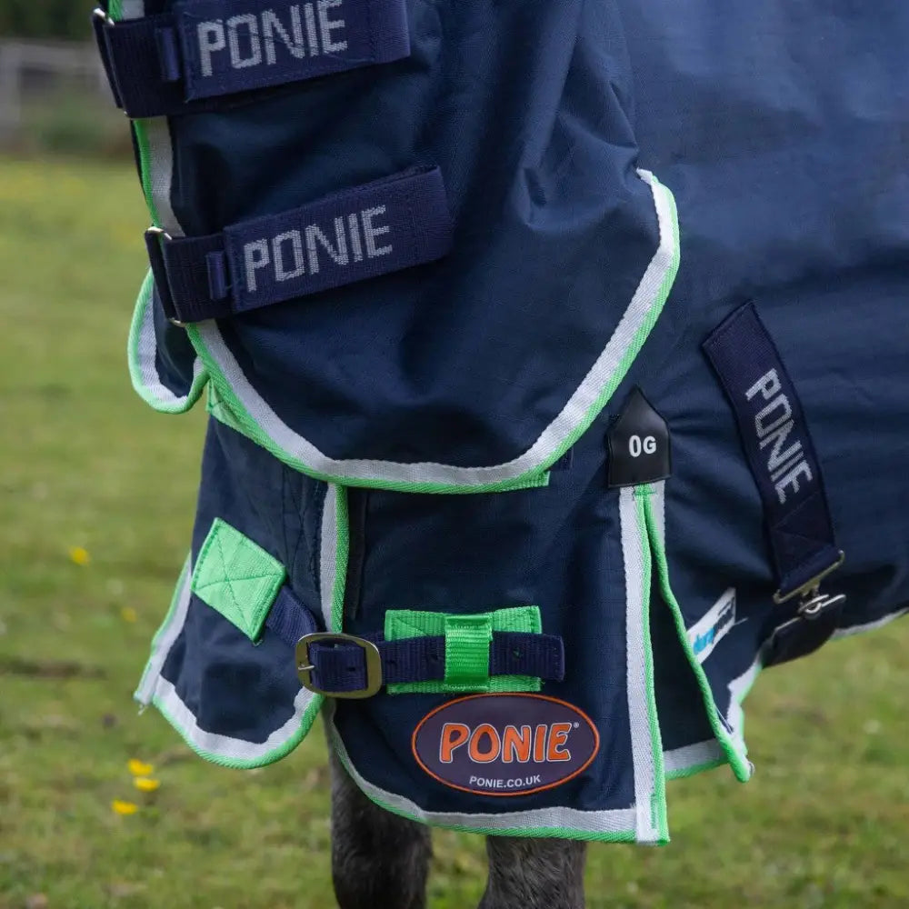 Dark blue gallop ponie duraproof lightweight turnout combo navy with bright green trim fixed neck and adjustable straps