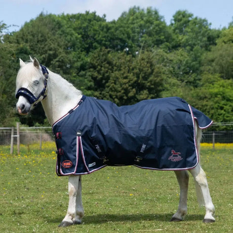 Navy blue gallop ponie duraproof 50g standard neck turnout horse blanket with white and red trim and prime logo on side