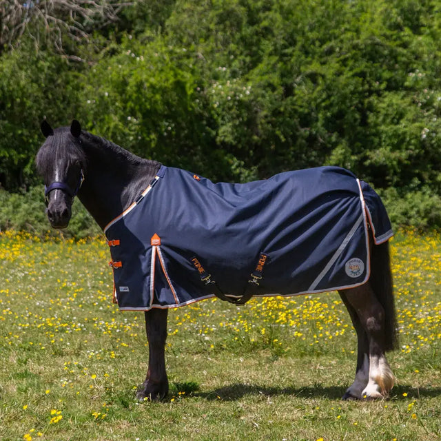 Navy blue gallop ponie xtra duraproof lightweight turnout rug with orange white trim reflective stripes and logo on side