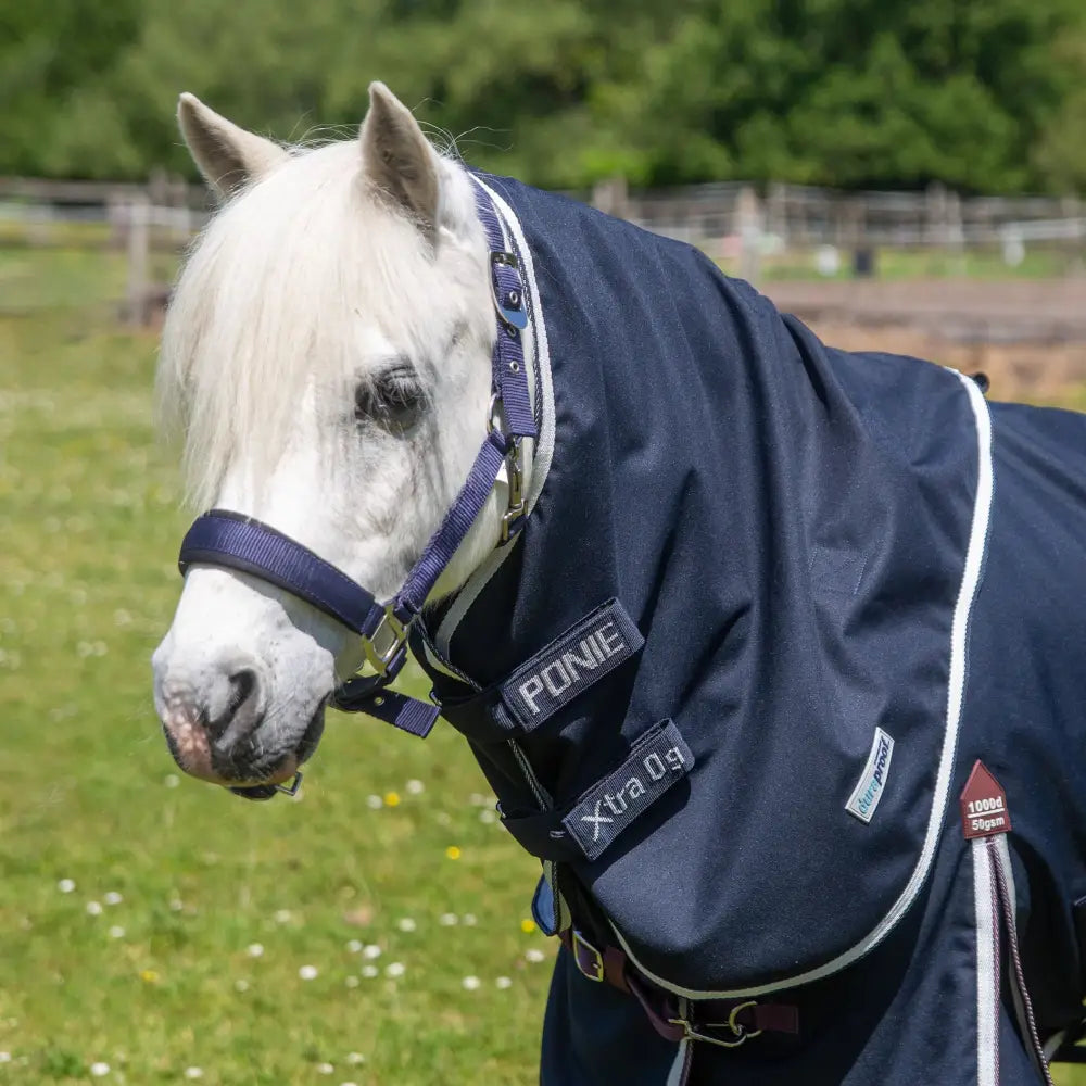 Navy blue gallop ponie xtra duraproof neck cover with white trim and purple straps lightweight horse blanket