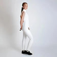 A sleek gallop sleeveless zipped neck base layer white jumpsuit with a high neckline and sleeveless design