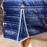 Deep navy blue quilted gallop trojan 300g stable rug with light gray trim and adjustable straps for heavy weight use