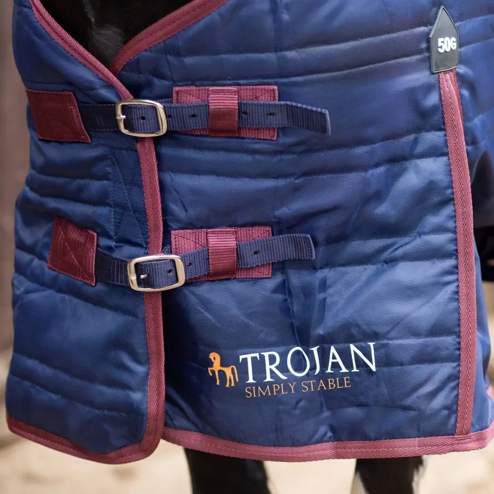 Blue quilted gallop trojan 50g stable rug lightweight with maroon trim silver buckles and trojan simply stable logo