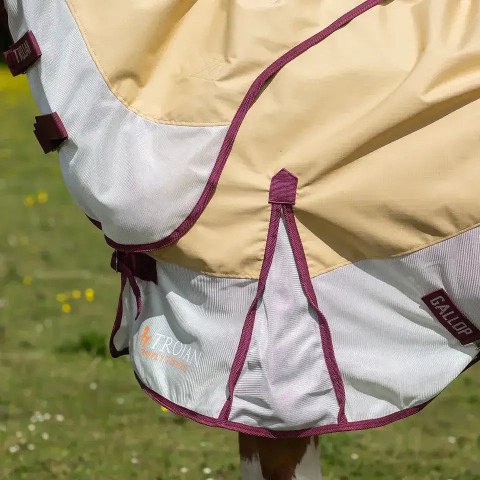 Beige and white trojan fly rug with maroon trim and trojan logo gallop trojan fly waterproof fly rug