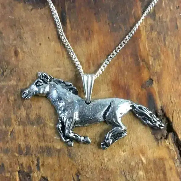 Silver galloping horse necklace with detailed horse pendant and textured chain perfect for everyday wear