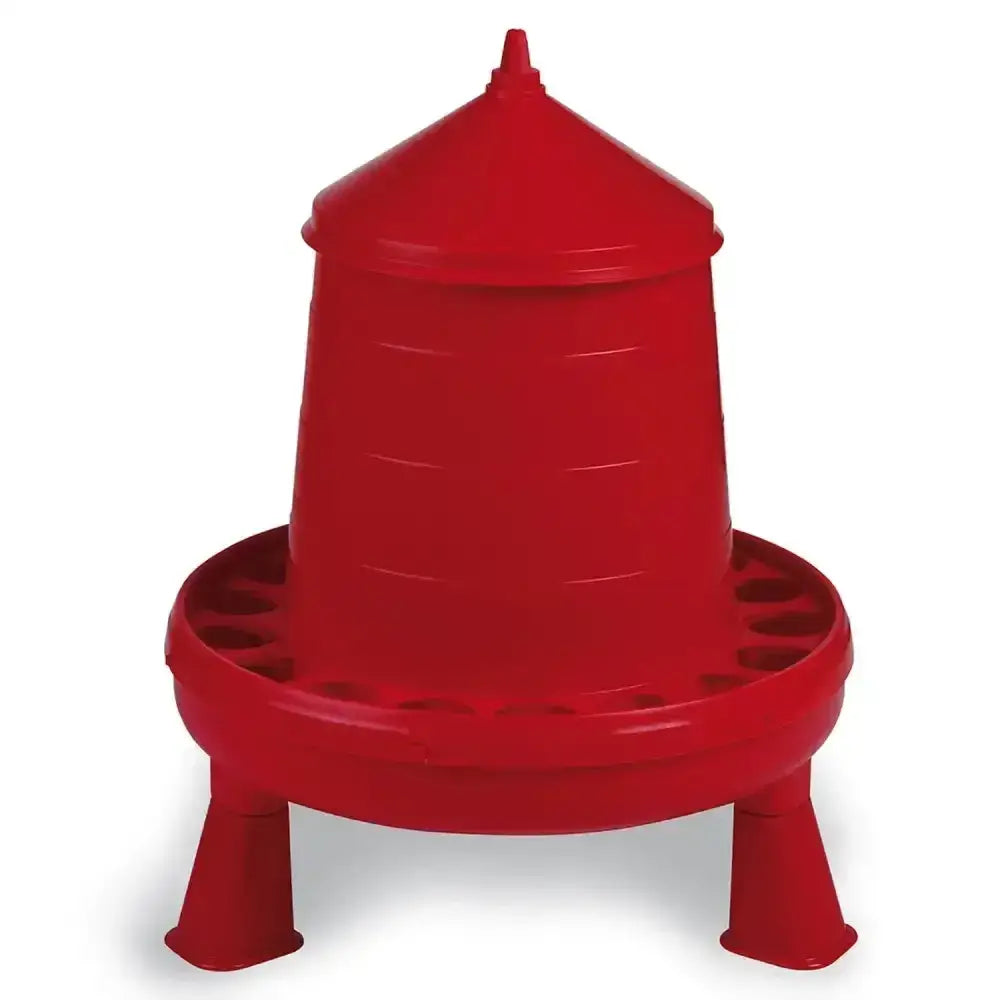 Red gaun poultry feeder made of durable plastic with tough red legs and a conical top with multiple feeding slots