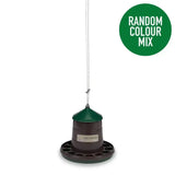 Dark green and brown gaun poultry feeder made from recycled plastic with conical top and multiple slots hanging by white string