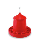 Red plastic gaun poultry feeder with conical top and circular base multiple feeding slots durable plastic feeder