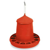 Red gaun poultry feeder with durable plastic conical body, circular base with slots, and metal hook for hanging